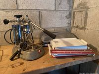 Overall view of espresso maker, food scale trays, and vacuum sealer