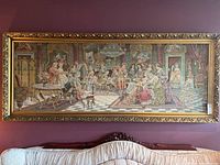 Full view of large framed tapestry showing an 18th-century elegant interior scene with figures and furnishings.