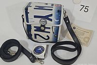 Vintage Little Earth Texas license plate style bag with certificate and extra strap.