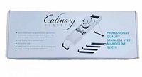Box of Culinary Concepts Professional Quality Stainless Steel Mandoline Slicer showing product image and text with features and blades depicted on box labeled "Professional Quality Stainless Steel Mandoline Slicer"