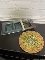 Photo showing both the condiment tray and the candy dish together on a table