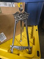 Front view of vintage Italian bronze picture easel with detailed ornate craftsmanship and beaded edging.