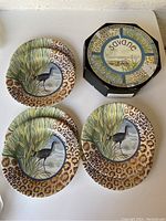 Three Savane dessert plates with leopard print border and original Savane box