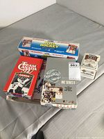 Photo showing four hockey card boxes: Pro Hockey wax pack, Team Canada '72 20th Anniversary Cards, NHL Series II 1991 Hockey Trading Cards, 1991 Collector NHL Set.