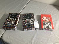 Photo showing two Score 6th Edition hockey card boxes and one Team Canada '72 box.