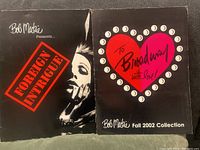 Outer folder cover for Bob Mackie Fall 2002 Collection titled 'To Broadway with Love' and Fall 2001 'Foreign Intrigue'.