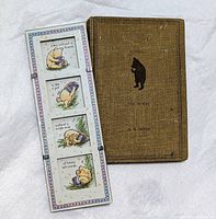Top down image of the vintage Winnie the Pooh book next to the rectangular Pooh picture frame with four illustrations and captions.