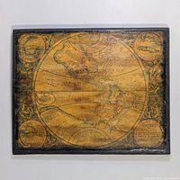 Full view of vintage reproduction map mounted on wood showing Americas with decorative cartouches