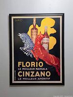 Full view of framed vintage Florio Cinzano advertising poster showing two bottles with red and blue horses and yellow abstract shape background.