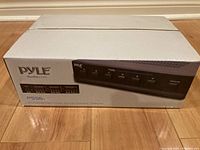 Pyle PS56 stereo speaker selector front view on box showing model and image of the unit