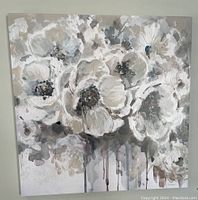 Full view of the square canvas floral print with neutral color palette and textured paint effects.