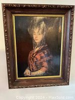 Front view of framed Spanish romantic portrait with carved wood frame and gold inner trim.