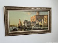 Front view showing the full framed painting hanging on a wall