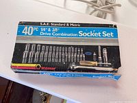 Box of Wilmar 40-piece S.A.E. Standard & Metric Drive Combination Socket Set, showing part of contents and brand on box
