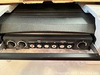 Close-up of Sony stereo cassette recorder control panel showing buttons and dials