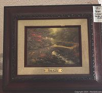 Front view of the framed Thomas Kinkade artwork titled "Bridge of Faith" showing the entire frame and painting.