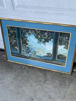 Full view of framed lithograph print showing two female figures with classical columns and mountain background.