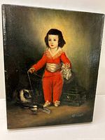 Full view of the oil painting showing the child in red with cat and birdcage and signature.
