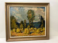 Full view of oil painting in gilt frame against a white background