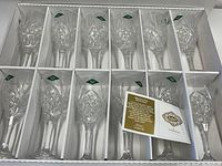 12-piece set of Godinger Dublin crystal lead wine glasses in box, all similarly styled with faceted cuts.