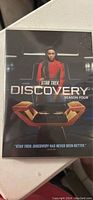 Front cover of Star Trek Discovery Season 4 DVD box featuring a character in red uniform.