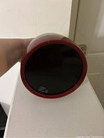 Top view showing dark red filter lens with Kodak branding and model information