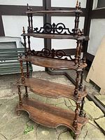 Front view of entire five-tier étagère showing overall form and finish