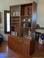 Full frontal view of entire cabinet with displayed items