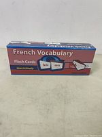 Front and side views of the sealed box of French Vocabulary Flash Cards showing branding and card count.