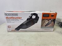 Front view of the vacuum's packaging showing branding and product image with key features like 20V Max PowerConnect and interchangeable battery.