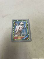 Photo of front of the Jerry Rice Topps card showing image and player info.