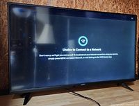 Front view of the Vizio 40" smart TV powered on showing a network connection error message on screen.