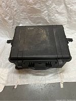 Top view of black Pelican 1620 hard case showing surface wear and closed latches.