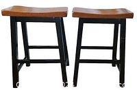 Pair of wooden bar stools showing front and side views, natural wood seat with black legs and crossbars.