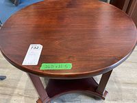 Full top view of the round wood side table showing the surface and diameter measurement.