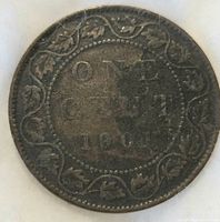 Reverse side of the large Canadian penny showing denomination ONE CENT and date 1900 with maple leaf vine border.