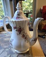Photo of the Royal Albert Lavender Rose coffee pot showing floral pattern and shape.