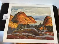 Full view of the limited edition print showing the landscape image of North Shore Lake Superior with surrounding rocky hills and forested area.