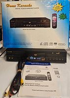 Blue and white box for Home Karaoke Digital VCD/CD Karaoke Player model HKV-898A with image of player and remote on front.