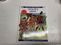 Front cover of the book showing the title, series name, edition, and illustrated soldiers in uniform with muskets.