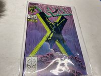 Photo of 'The Uncanny X-Men' comic book issue #251 front cover in a protective sleeve.
