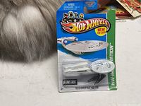 Hot Wheels 2012 U.S.S. Enterprise diecast model on original blister card packaging, mint condition