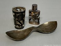 Photo showing all three items: shot glass, perfume bottle, and double dish