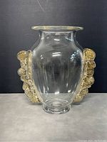 Front view of clear Murano glass vase with gold decorative handles.