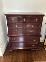 Front view of entire chest showing drawer configuration and hardware