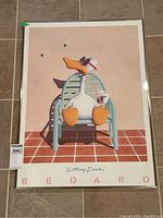 Full view of framed Sitting Duck print showing entire artwork and metal frame