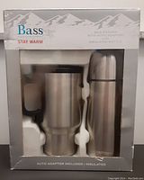 Boxed set showing Bass brand with insulated travel mug and bottle.
