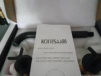 Original packaging showing the installation guide and components inside the box.