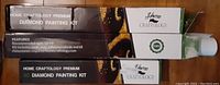Side view of three boxed Craftology Premium 5D Diamond Painting Kits