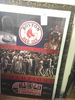 Front view showing the Boston Red Sox team celebrating their 2007 World Series victory with text and trophy image.